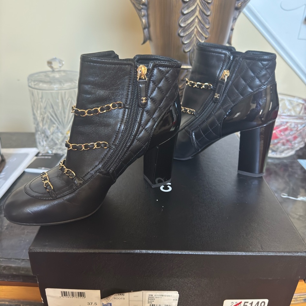 Chanel Chic Black Quilted Ankle Boots with Gold Chain Detail